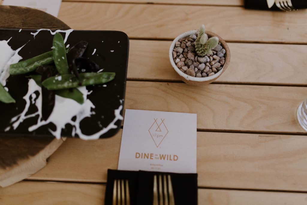 Snow Peas with Menu on Rustic Wooden Table with Cactus