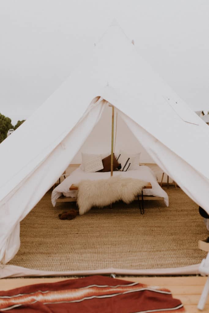 The Interior of a Canvas Safari Tent with Southwestern Decor, Located at a Glamping Retreat in Santa Fe New Mexico